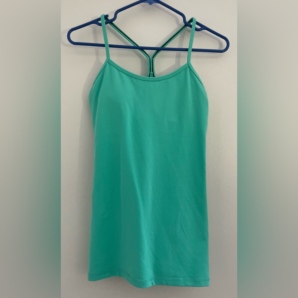 Lululemon tank with built-in-bra. Wore only a few times but removed size tag